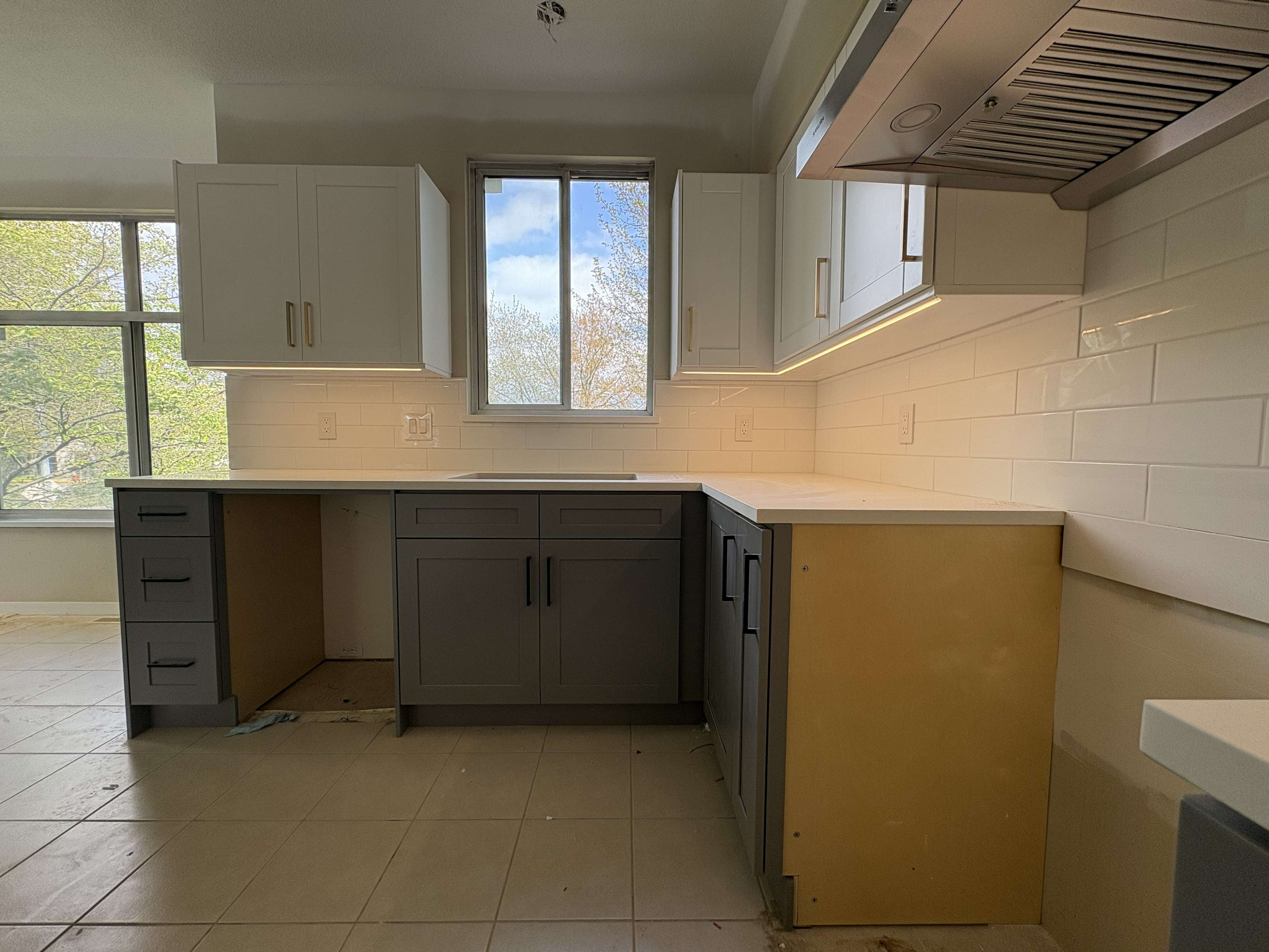 Kitchen cabinet LED lighting and new hood fan replacement — Gubond Electrical