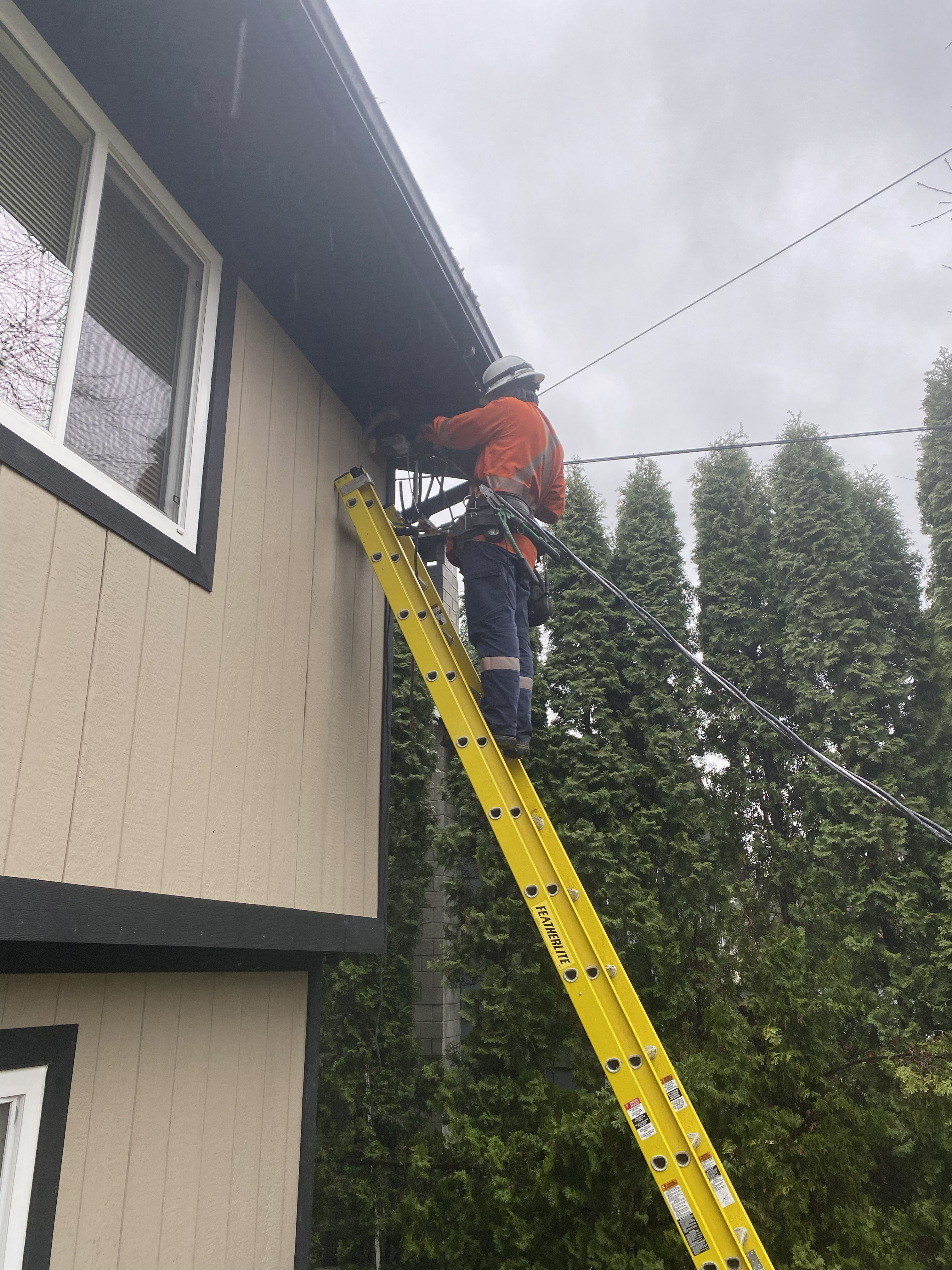 BC Hydro contractor connecting overhead service